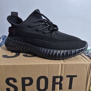 All-Black Knit Athletic Sneaker with Red Heel Tab